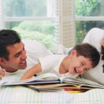 Happy Family spending time reading instead of cleaning the house